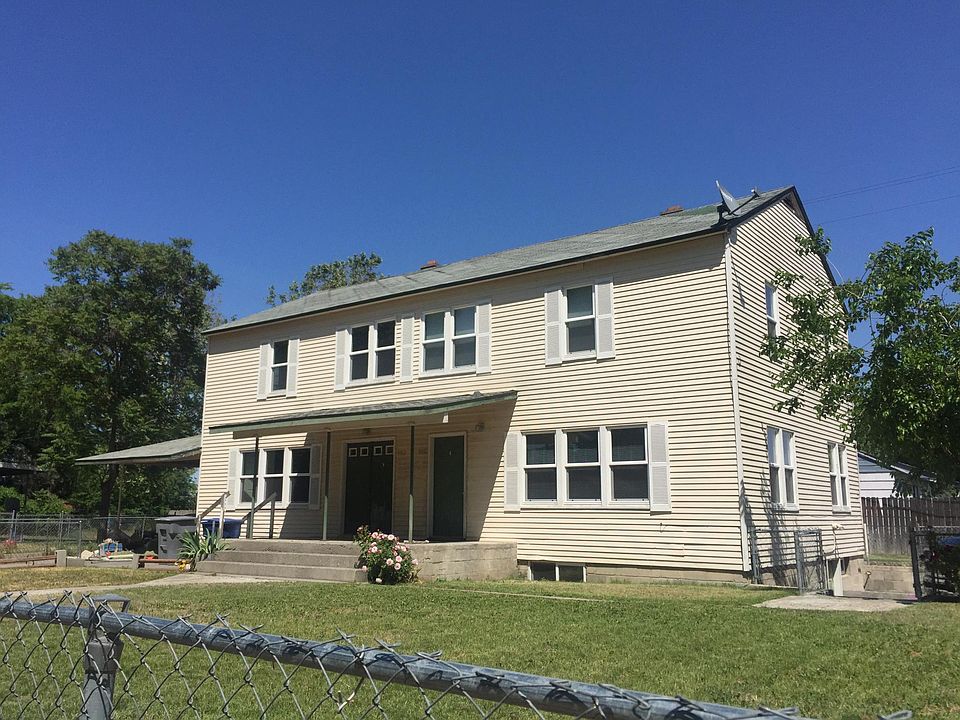 Front Elevation, fenced yard front and back
