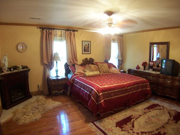 Master bedroom w/ elec. fp