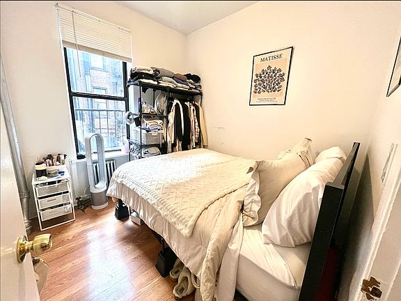 5th image of 430 E 11th St APT 4