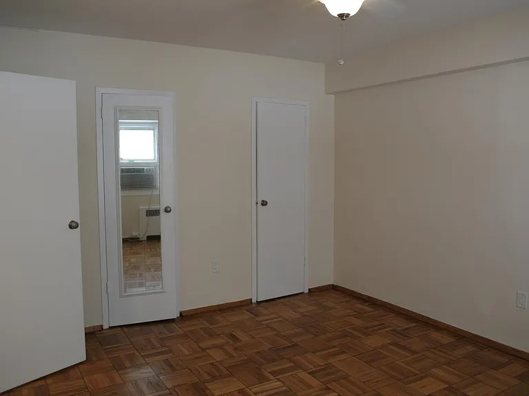 Bedroom view of double closets