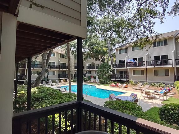 Deck with view of pool