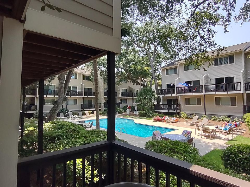 Deck with view of pool
