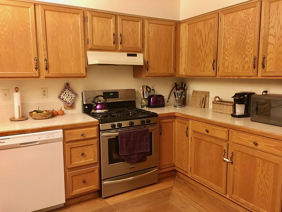 Kitchen with new stove, fridge, and dishwasher