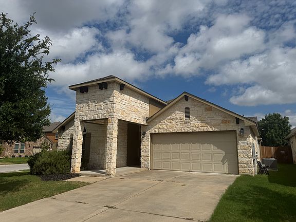 4 sided stone exterior, spacious covered front porch