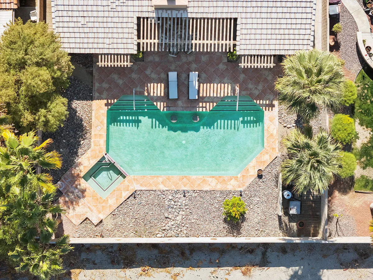 This home is located in the quiet community of Acacia La Quinta, right across the Indian Wells Tennis Gardens. - 78730 W Harland Dr