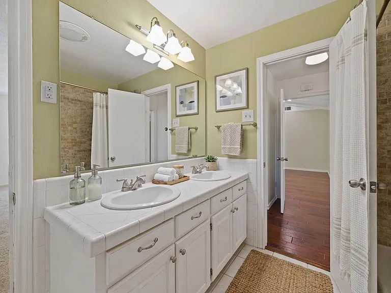 Virtually staged to show potential furniture and decor layout.