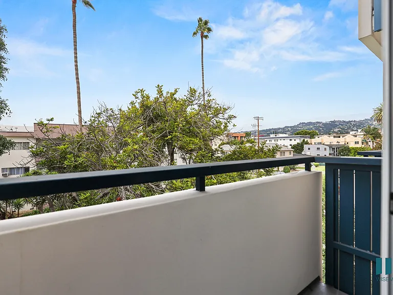 Upper-Level Patio with Skyline Views