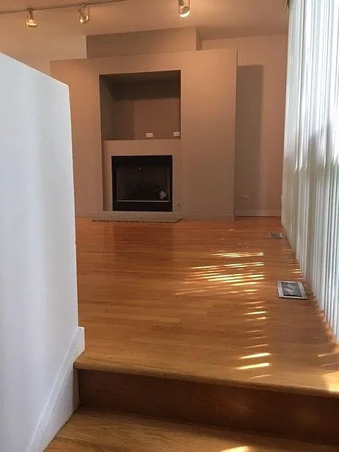 walking up to main level--fireplace