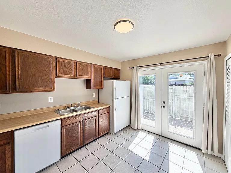 Two-Level 2BR with Fenced Yard & Washer/Dryer Hookups — Photo 1