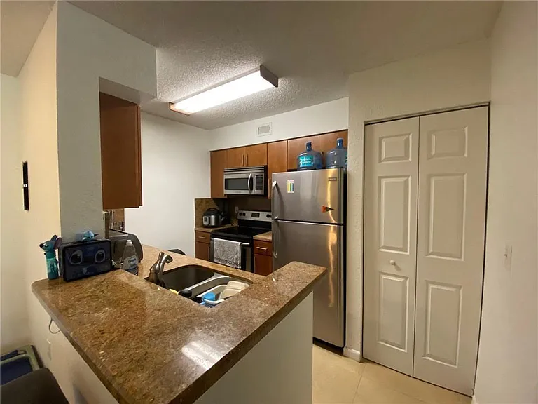 2841 N Oakland Forest Dr #107 — Photo 3