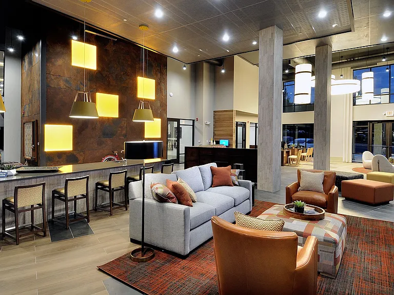 Our well-appointed clubroom is complete with lounge seating and ample entertainment options.