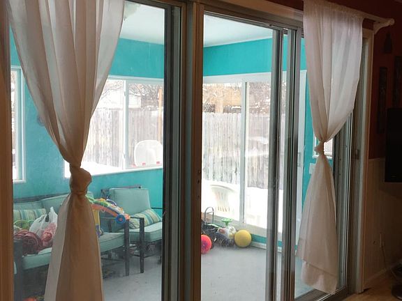 FAMILY ROOM VIEW TO PATIO/SUNROOM