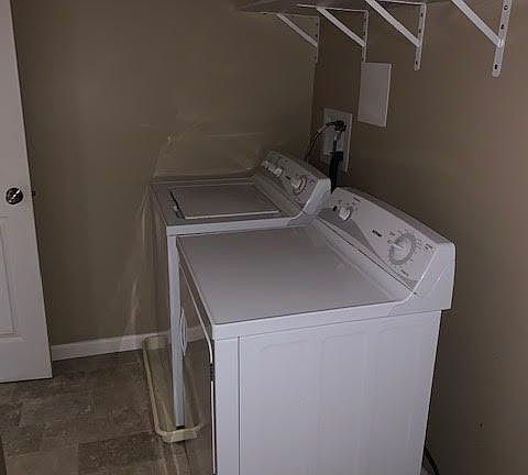 Laundry room in the unit.