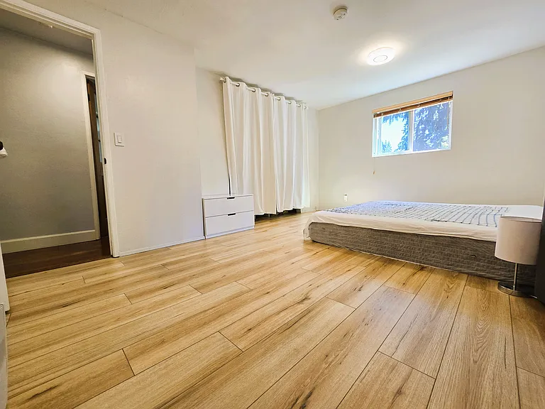 Newly installed LVP flooring in master