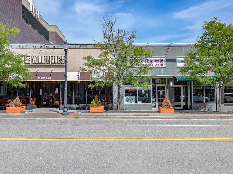 Less than a mile from the shops and storefronts of Main Street.