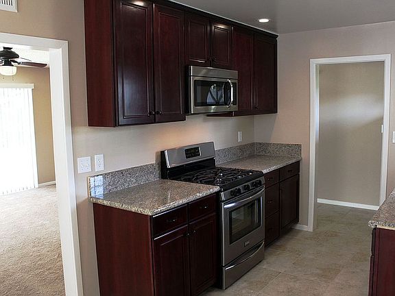 new kitchen cabinets, granite counter tops and new stainless stove & microwave