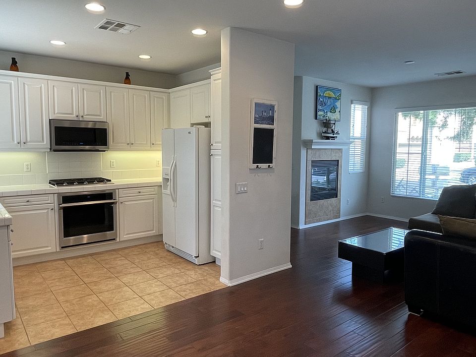View of the kitchen and living room from the dining area