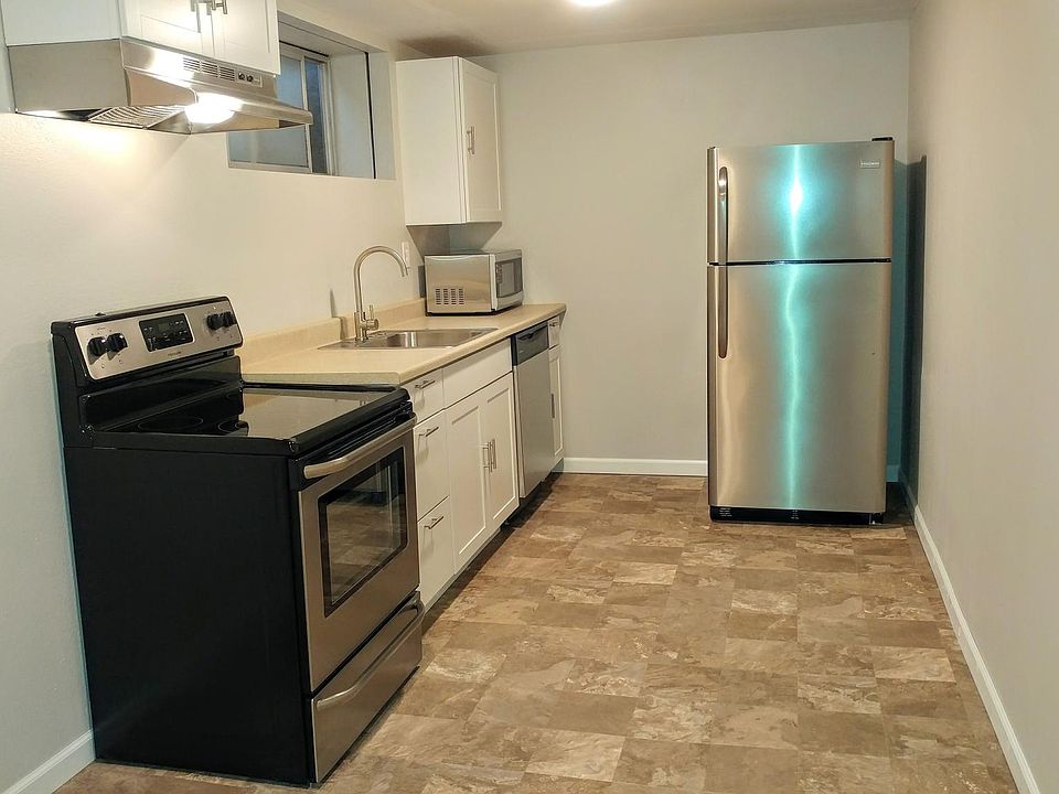 Kitchen w/ stainless steel appliances.
