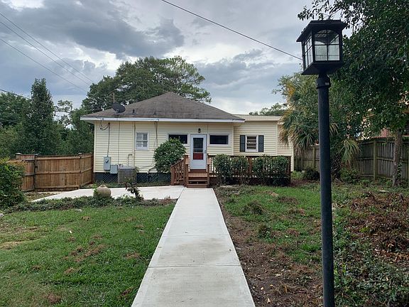 Rear of house with new deck and patio