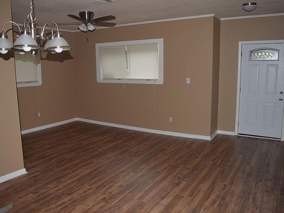 Living Room-brand new wood flooring, fresh paint, brand new