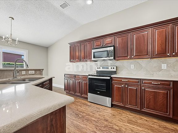 4th image of 2320 Brian Lakes Dr E