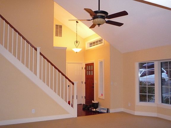 Entrance/vaulted living room