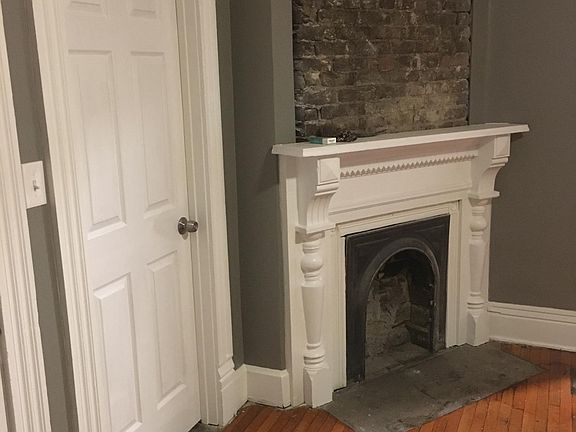 Exposed Brick fireplace.