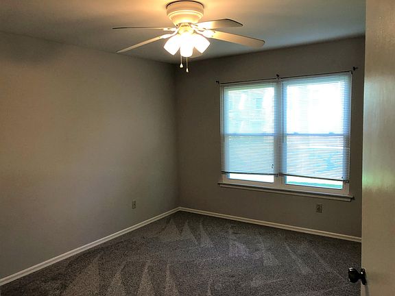 Bedroom windows look over the rear yard area,