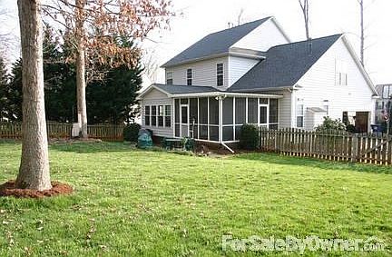 Back of house
						:
						View of screen porch