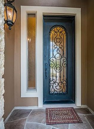 Gorgeous front door with sidelight.
