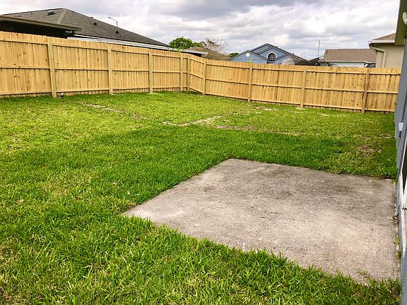 Fenced back yard for privacy, children and pet to play.