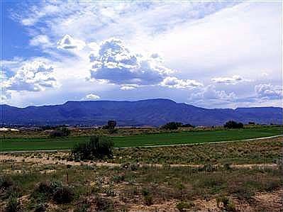 Unobstructed views of mtns., golf & sky.