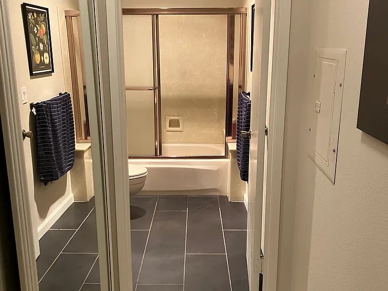 Hallway leading to separate private bedroom from renter's bedroom