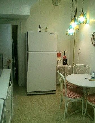 Shows end of kitchen/pantry 