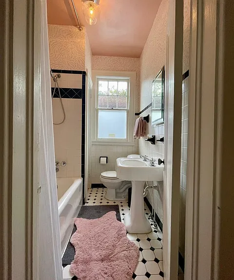 The guest bathroom is nostalgic and pretty!