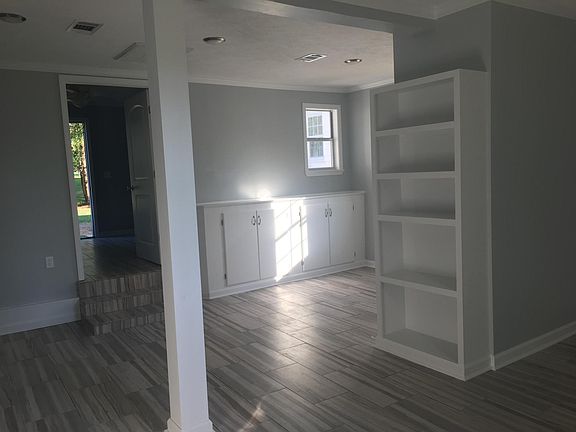 Open den/Kitchen area with LOTS of storage space