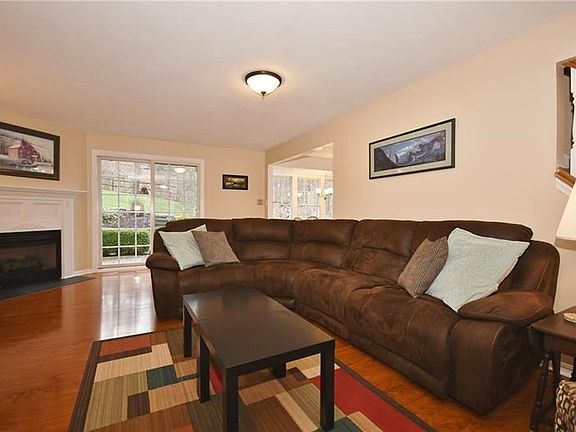 The large family room is wide open for easy entertaining and family communication, PLUS it boasts plenty of space for all your f