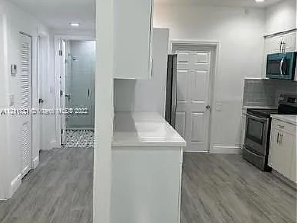 Three bedrooms on one side of the home and living space on the other side of the home.
