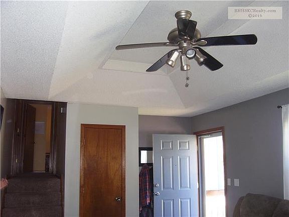 View of ceiling and stairs going to bedrooms