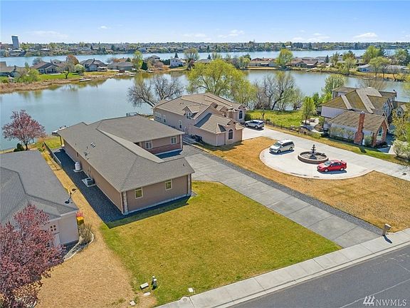 Home is located on a protected bay with quick and easy access to the main lake.  Water is deep in front of the house with a nice sandy bottom.  