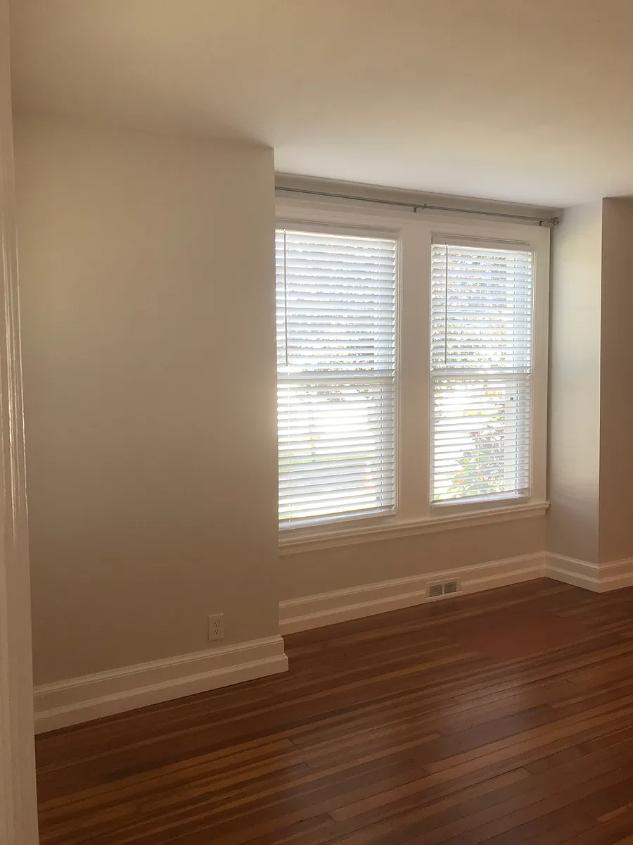 Living room windows 
Upgraded blinds & curtain rods installed throughout townhouse - 20 Hillside Ave