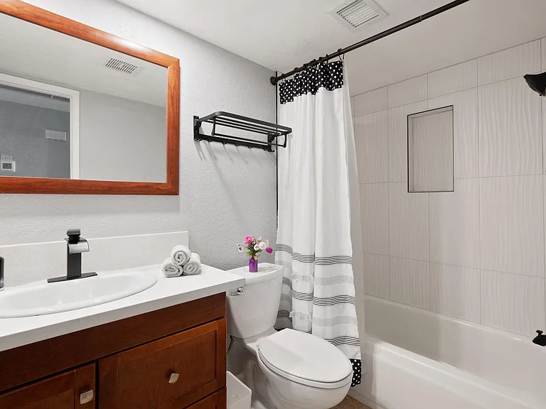 Centrally located bathroom in hallway