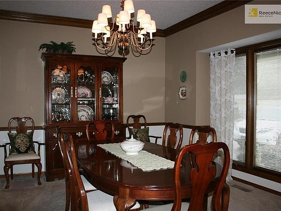 Your formal dining room is ready for all you guests. Freshly painted and a new light fixture.