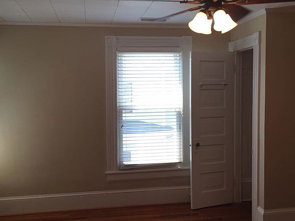 Hardwoods and ceiling fan in BR
