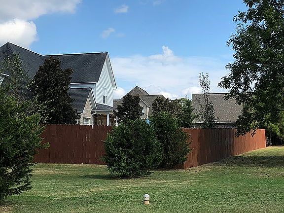 Fenced backyard. 