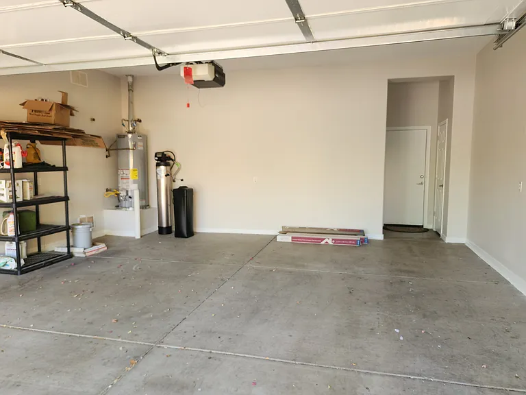 Finished two-car garage with insulated door