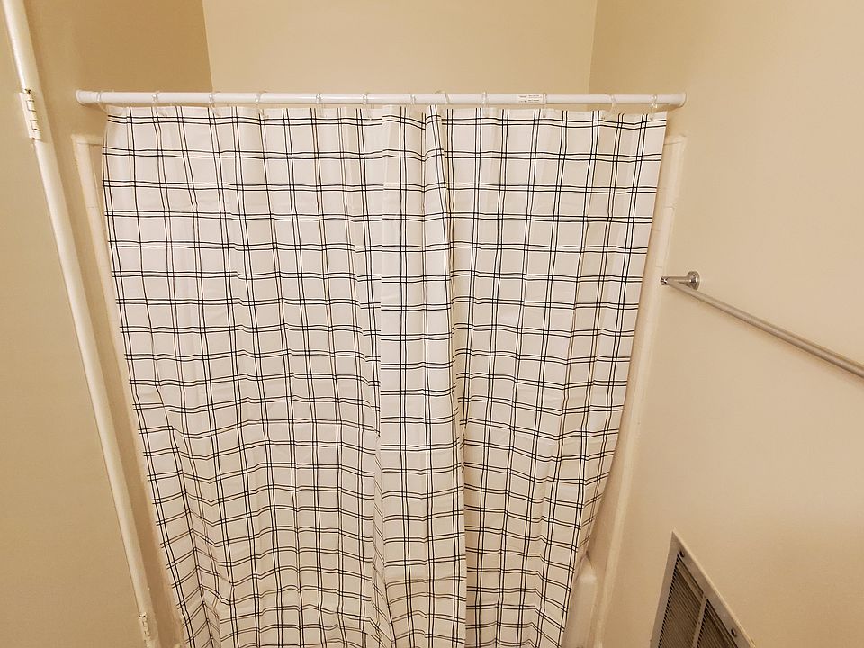 Bathtub with shower curtain