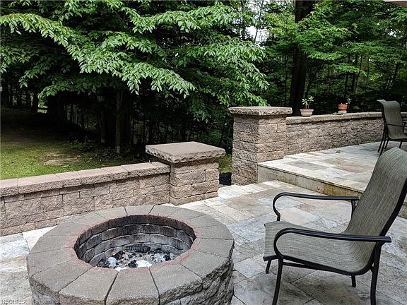 The built-in fire pit and knee walls is a must see!