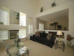 Living Room - step up to Formal Dining Room