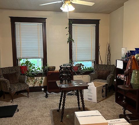 Looking through columns from Dining Room into spacious Living Room.